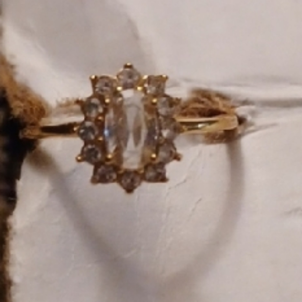 4/$60 Gold Solitaire Ring with Starburst Crystal Design